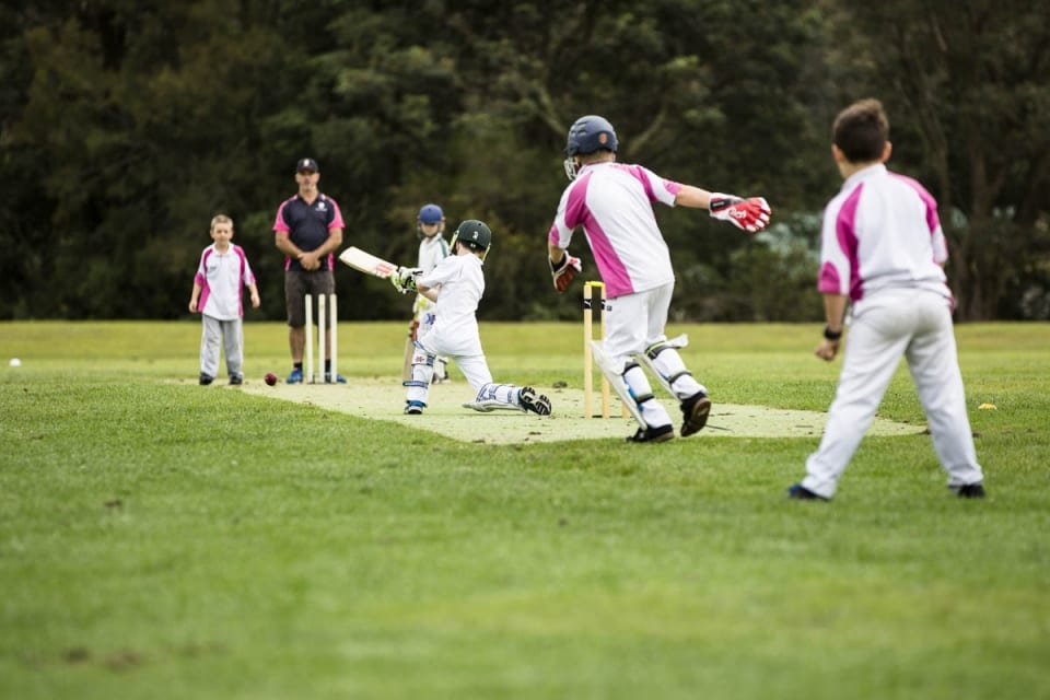 Kids playing cricket at practice